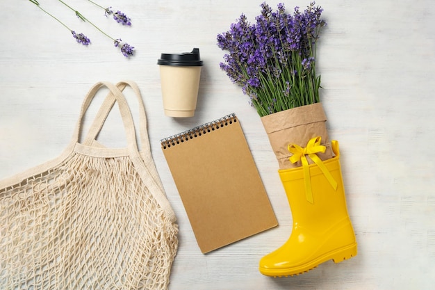 Cozy composition with lavender flowers on wooden table