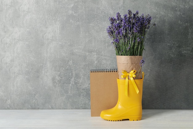 Cozy composition with lavender flowers on wooden table