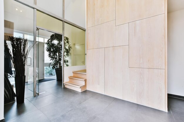 Cozy entrance part of the house with a glass door