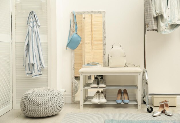 Cozy hallway interior with storage bench and stylish design elements