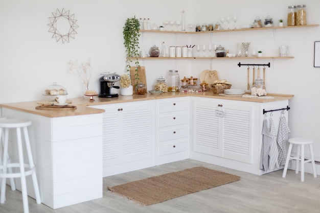 Cozy white kitchen interior made in rural style