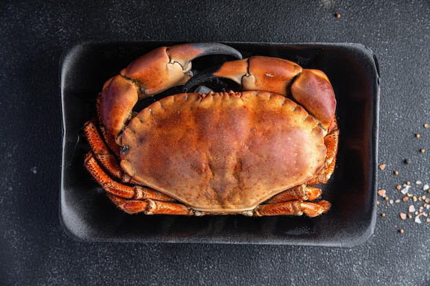 Photo crab boiled seafood ready to eat shellfish fresh healthy meal food snack on the table copy space