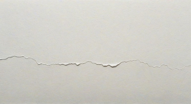 Photo a crack in a piece of paper that has been torn off