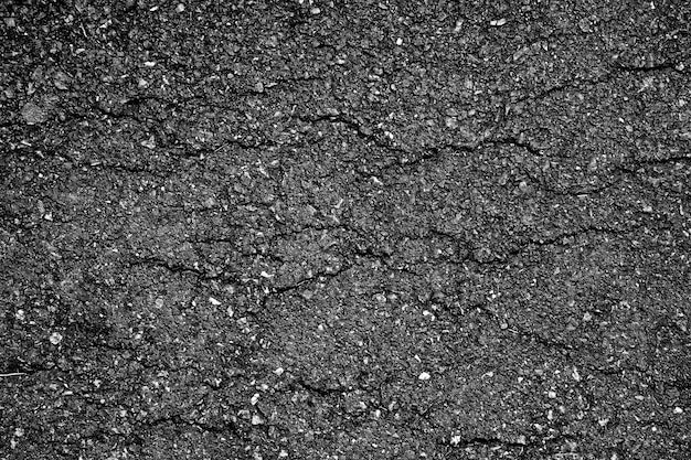 Crack and texture of asphalt road background