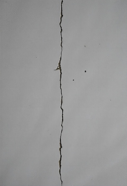 Photo a crack in a wall that has been torn off