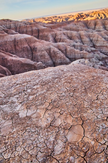 Cracked desert grounds of badlands sediment layers