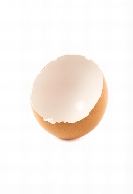 Photo a cracked egg is broken in a white background