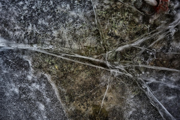 cracked ice texture, abstract seasonal winter cold background, natural ice, broken ice on a lake