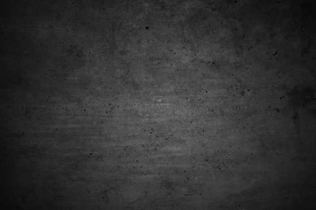 Cracked walls dark gray concrete concrete floor is aged in a retro concept Texture of a grungy black concrete wall as background