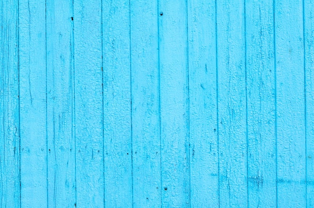 Cracked weathered blue shabby chic painted wooden board texture front view