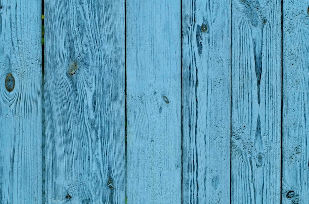 Cracked weathered green and blue painted wooden board texture