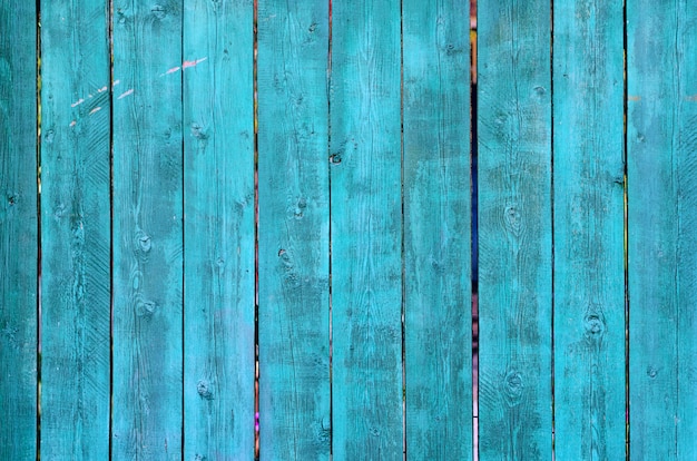 Cracked weathered green and blue painted wooden board texture