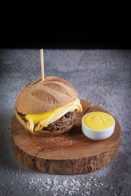 Craft beef burger with australian bread, cheese and honey mustard sauce