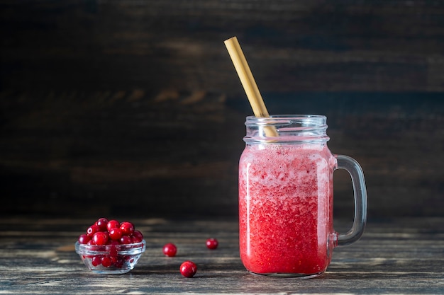 Cranberry and cowberry smoothie in mason jar