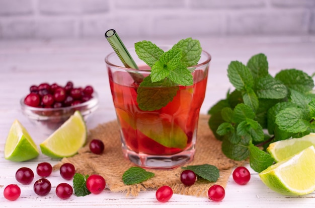 Cranberry, lime and mint cocktail. Refreshing vitamin drink.