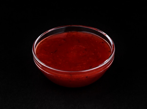 Cranberry sauce isolated on black