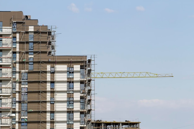 Crane and building construction site