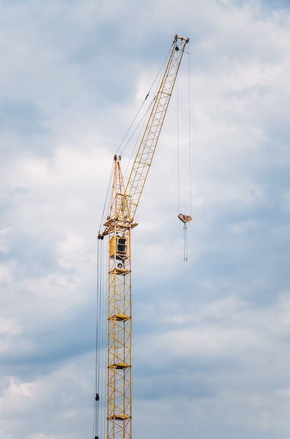 Crane tower on sky.