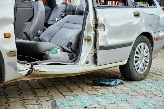 Crashed car after traffic accident on road