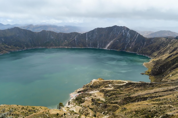 Crater of Quilotoa volcano filled with turquoise water Cotopaxi Ecuador