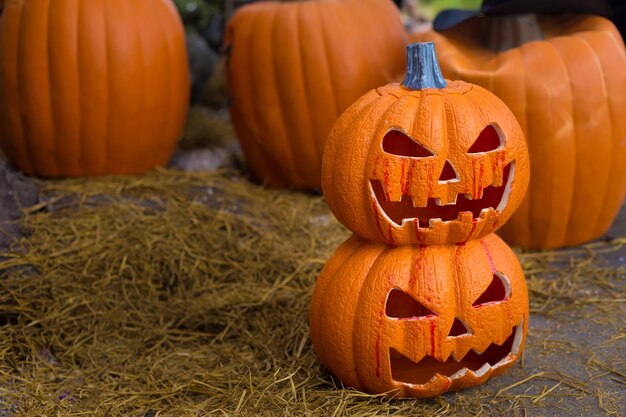 Craved pumpkin head jack lantern is decorated with scary theme in Halloween holiday