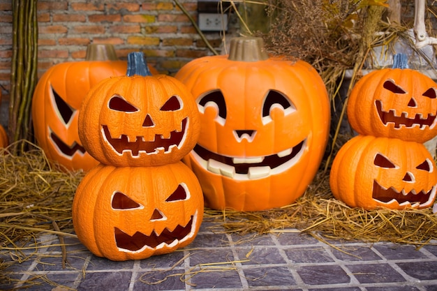 Craved pumpkin put on rice straw  in Halloween theme.