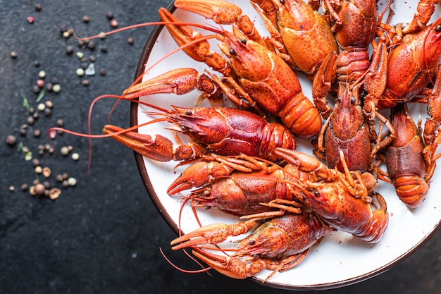 Crayfish red fresh boiled seafood crustaceans meal snack on the table copy space food background