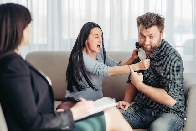 Crazy couple patients at psychotherapist reception