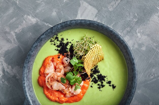 Cream of asparagus soup with shrimp