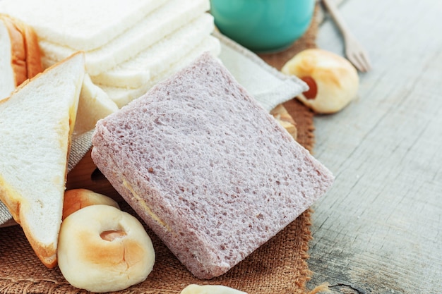 Cream bread on wooden.