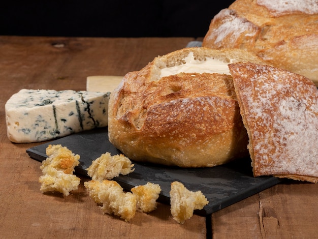 Cream cheese inside Italian bread with croutons, fondue..