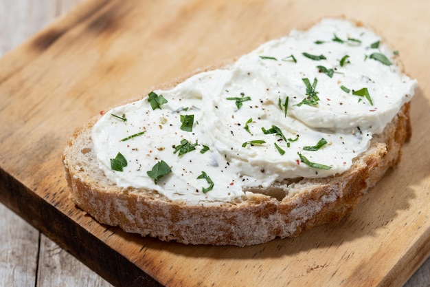 Cream cheese toast on cutting board