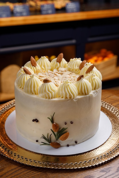 Creamy almond cake. Close-up with blurred background.