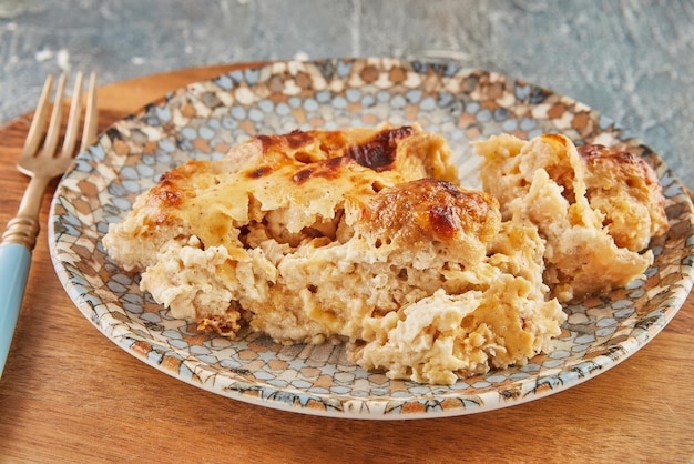 Creamy cauliflower in bowl on wooden stand