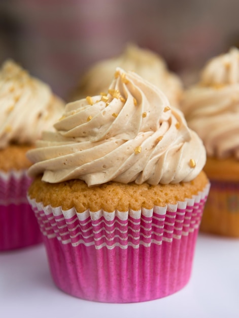 Creamy cupcakes on a tray