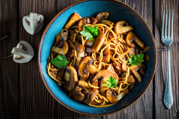 Creamy spaghetti with mushrooms mushrooms and parsley