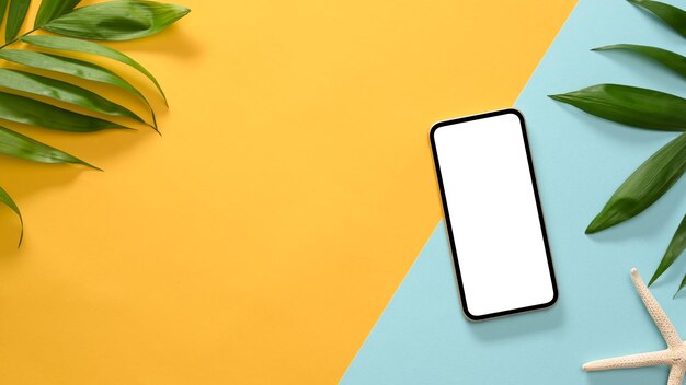 Creative colourful background with smartphone mockup summer accessories and copy space top view