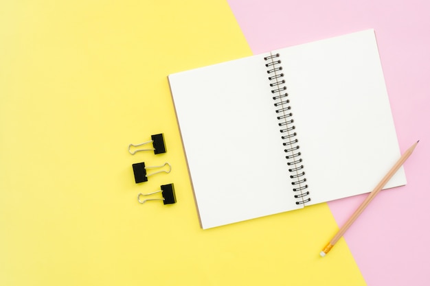 Creative flat lay photo of workspace desk. Top view office desk with open mock up notebooks and pencil