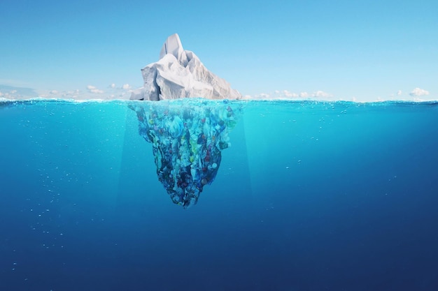 Creative iceberg floating in the ocean with garbage plastic bottles underwater Global warming and pollution a concept Pollution of water and oceans