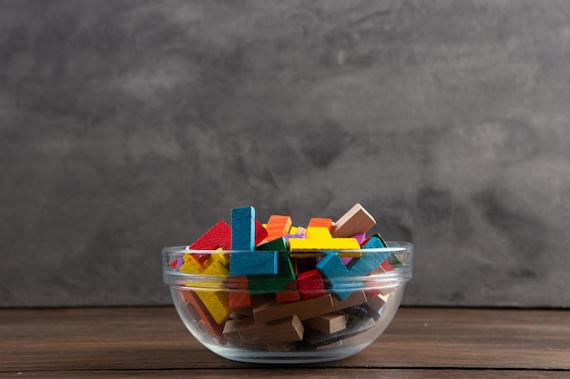 Creative idea concept wooden puzzle in bowl with spoon Develop new idea food for inspiration