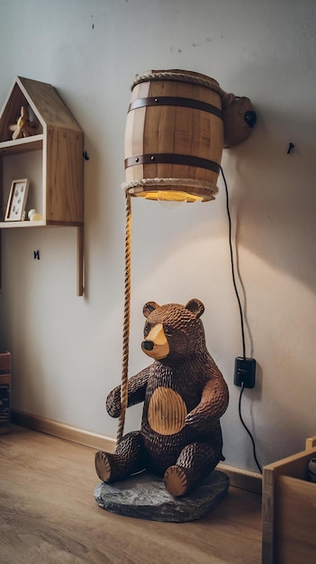 Creative lamp in the childrens room drawn bear holding a rope with a lamp on the wall