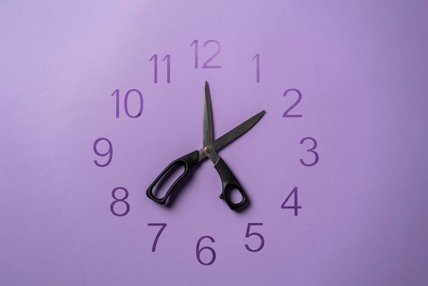 A creative layout of hour clock made of scissors on pastel background