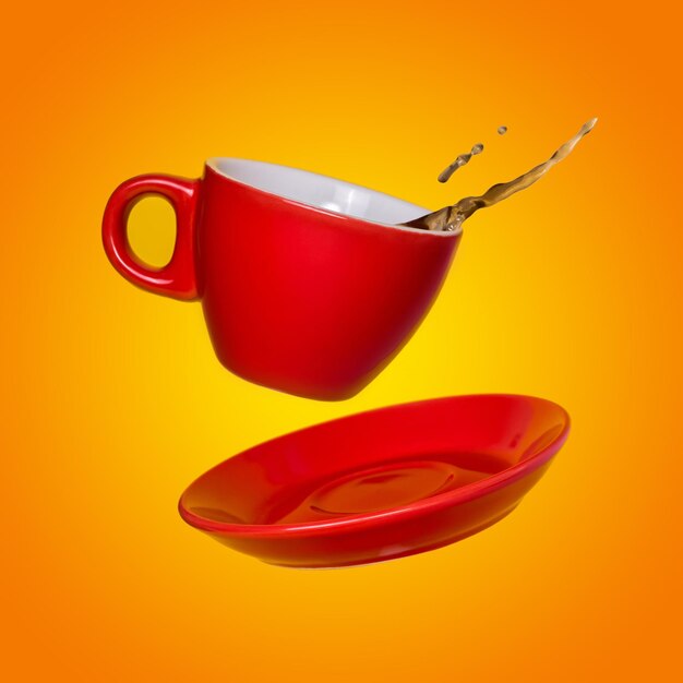 Creative surreal design with a red coffee cup and saucer on a yellow background