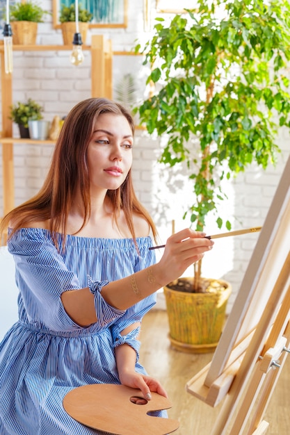 Creative woman working in art studio