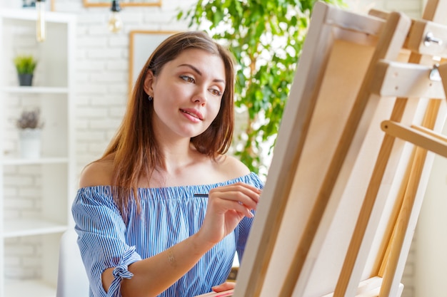 Creative woman working in art studio