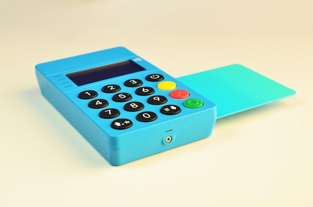 Credit card payment machine. POS terminal and bank card. Concept of payments, money,