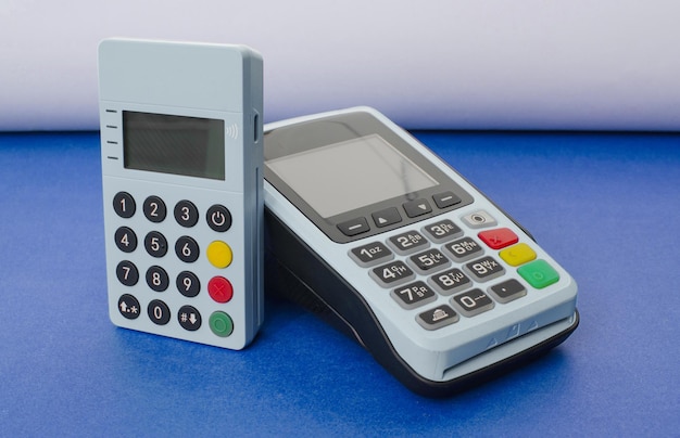 Credit card payment machinePOS terminal and bank cardConcept of payments money purchases