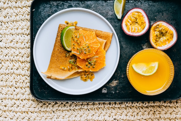 Crepes Or Thin Pancakes With passion fruit and lime