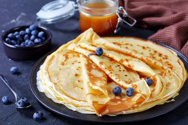 crepes with blueberries and buttermilk syrup