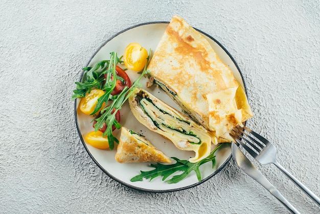 Crepes with stuffed cream cheese spinach turkey Cuisine meal food concept Top view